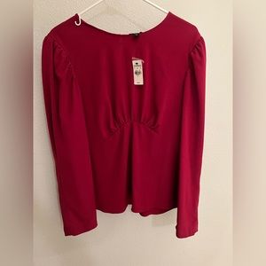 EXPRESS, Size L, NWT, wine colored long sleeved blouse.